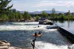 Line of kayakers